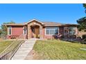 Beautiful ranch home with welcoming front entrance at 8547 Gold Peak Dr # G, Highlands Ranch, CO 80130