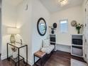 Bright entryway with built-in bench and storage at 1577 S Pennsylvania St, Denver, CO 80210