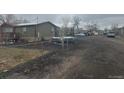 Mobile home with a fenced yard and additional space at 3440 W 66Th Ave, Denver, CO 80221