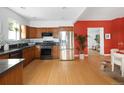 Modern kitchen with stainless steel appliances and granite countertops at 1473 Yates St, Denver, CO 80204