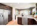 Modern kitchen with granite countertops and stainless steel appliances at 3200 N Fillmore St, Denver, CO 80205