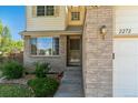 Front entrance with steps leading up to the house at 2272 S Fundy Way, Aurora, CO 80013