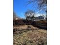Backyard with a wooden fence and some landscaping at 2792 S Macon Cir, Aurora, CO 80014