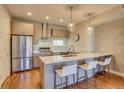 Modern kitchen with stainless steel appliances and an island at 4364 W 29Th Ave, Denver, CO 80212