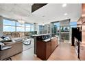 Open concept kitchen with modern cabinetry and city views at 1700 Bassett St # 1601, Denver, CO 80202