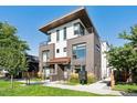 Modern three-story townhome with landscaping at 2929 Lawrence St # 2, Denver, CO 80205