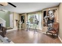 Spacious living room with a fireplace and large windows at 1736 S Pagosa Way, Aurora, CO 80017