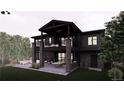 Modern home with stone and dark siding, a large patio, and landscaped yard at 15363 Irving Ct, Broomfield, CO 80023