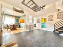 Modern kitchen with stainless steel appliances and tile flooring at 4208 S Sherman St, Englewood, CO 80113