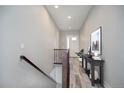 Bright and airy entryway with tile floors and modern decor at 7030 S Buchanan St, Aurora, CO 80016