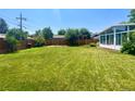 Spacious backyard with grassy lawn at 2890 Leyden St, Denver, CO 80207