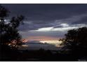 Scenic view of mountains at sunset from the property at 295 E Amherst Ave, Englewood, CO 80113