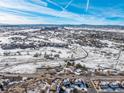 Aerial view showcasing the property's location and surrounding landscape at 567 Lake Gulch Rd, Castle Rock, CO 80104