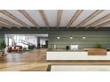 Elegant lobby with modern finishes and comfortable seating at 12983 W Ida Ave # 111, Littleton, CO 80127