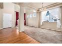 Bright and spacious living room with hardwood and carpeted floors at 4050 S Odessa St, Aurora, CO 80013