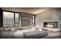 Spacious living room with a fireplace and large windows offering mountain views at 24 N Moffat Rd, Arvada, CO 80403