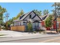 Charming craftsman home with gray exterior, wood fence, and landscaping at 3622 W 29Th Ave, Denver, CO 80211