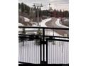 View from balcony showing snowy mountain scenery and ski lift at 1627 Ski Hill Rd # 2236Eghi, Breckenridge, CO 80424