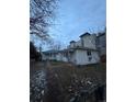 White duplex home with yard at 3577 S Pennsylvania St, Englewood, CO 80113