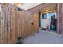 Townhouse entryway with wooden fence and gate at 8051 Wolff St # C, Westminster, CO 80031