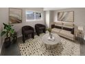 Living room with beige couch and contemporary decor at 6800 E Tennessee Ave # 232, Denver, CO 80224