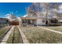 House with driveway, landscaping, and carport at 2031 Meade St, Denver, CO 80211