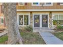 Townhouse exterior with two entrances at 1342 S Idalia St, Aurora, CO 80017
