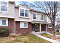 Attractive two-story townhome with a well-maintained lawn at 18397 E Alabama Pl # D, Aurora, CO 80017