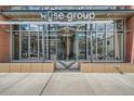 Modern building entrance with glass doors and the Wyse Group logo at 1499 Blake St # 1A & 1B, Denver, CO 80202