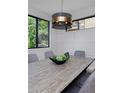 Close-up of the dining table with a decorative centerpiece at 3916 N Raleigh St, Denver, CO 80212