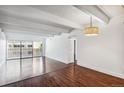Bright living room with hardwood floors and balcony view at 8060 E Girard Ave # 419, Denver, CO 80231