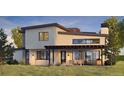 Contemporary home with backyard patio and outdoor kitchen at 5292 Lions Paw St, Castle Rock, CO 80104
