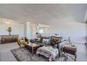 Bright and airy living room with ample seating at 1155 N Ash St # 1504, Denver, CO 80220