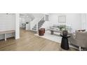 Bright living room with hardwood floors and modern furniture at 11830 E Canal Dr, Aurora, CO 80011