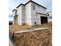 New construction home with vinyl siding and a two-car garage at 22271 E 38Th Pl, Aurora, CO 80019