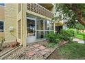 Ground level patio with gravel and potted plants at 3164 S Wheeling Way # 107, Aurora, CO 80014