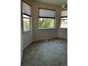 Dining area with tile floors and large windows with blinds at 2217 S Telluride Ct, Aurora, CO 80013