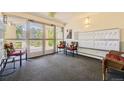 Lobby area with seating, mailboxes, and exit at 585 S Alton Way # 2C, Denver, CO 80247