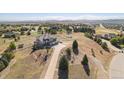Two-story house on a large lot with a view of the surrounding area at 9508 E 147Th Ave, Brighton, CO 80602