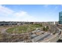 View of park and city from a condo building at 1590 Little Raven St # 706, Denver, CO 80202