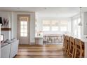 Kitchen breakfast nook with built-in bench seating and window views at 1221 W 144Th Ct, Westminster, CO 80023