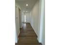 Clean entryway with hardwood floors and recessed lighting at 5563 Wisteria Ave, Firestone, CO 80107