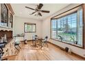 Bright dining area with hardwood floors and bay window at 10800 W 39Th Pl, Wheat Ridge, CO 80033