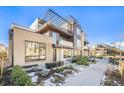 Modern townhouse with sleek exterior and landscaping at 6920 E Lowry Blvd # F1P9, Denver, CO 80230