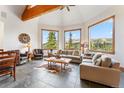 Open living room with mountain views and comfortable seating at 384 Camron Ln, Breckenridge, CO 80424