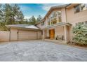 Two-story house with attached garage and snowy driveway at 11 Granite Dr, Boulder, CO 80302