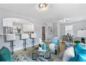 Bright and airy living room with open floor plan at 4424 Decatur St, Denver, CO 80211