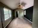 Spacious bedroom with carpeted floors and a ceiling fan at 1514 S Buckley Way, Aurora, CO 80017