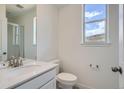 Clean bathroom with a white vanity and a shower at 3230 S Russell St, Morrison, CO 80465