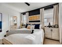 Spacious bedroom with large windows and stylish decor at 356 N Geneva St, Aurora, CO 80010